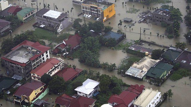 Philippine Air Force aerial photograph of buildings submerged by floodwaters