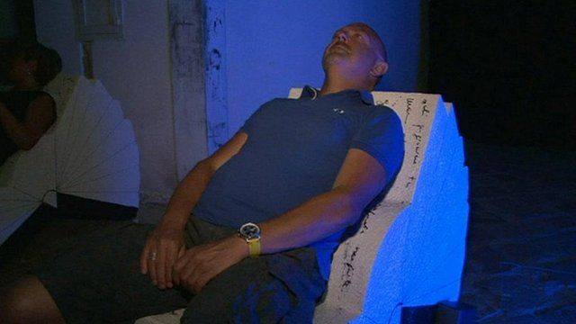 Man sitting on a "philosophical sofa".