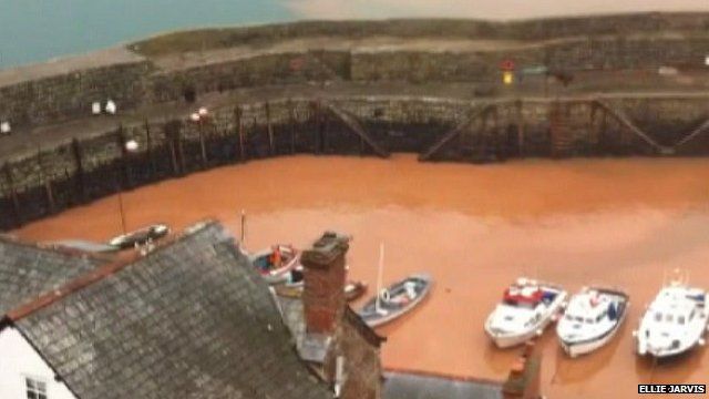 Flood water gushed into the harbour