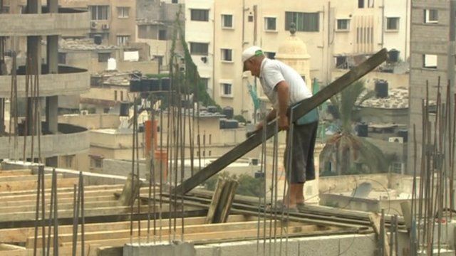Man works on building site in Gaza