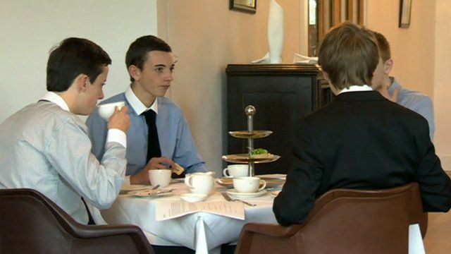 Young boys eating lunch