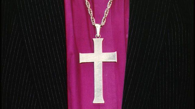 Cross and clothing of Church of England Bishop