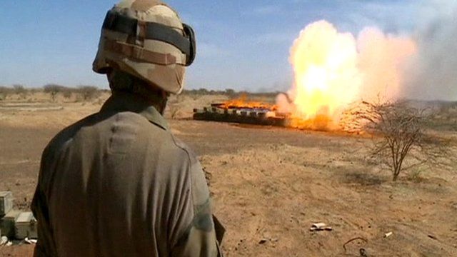 Soldier burning seized ammunition