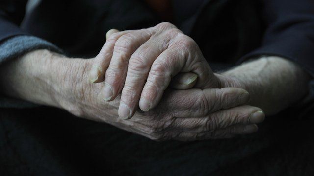 hands of an elderly man