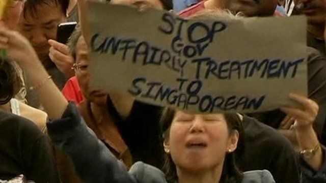 Woman with placard at protest