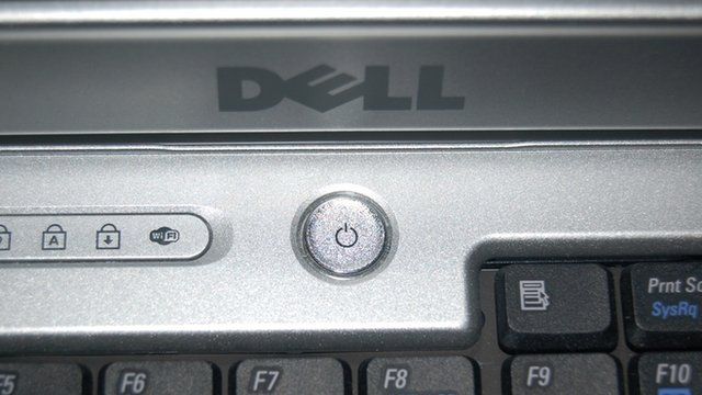 Power button and logo on Dell laptop keyboard