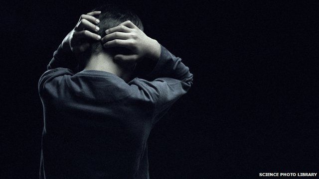 Man with head in his hands