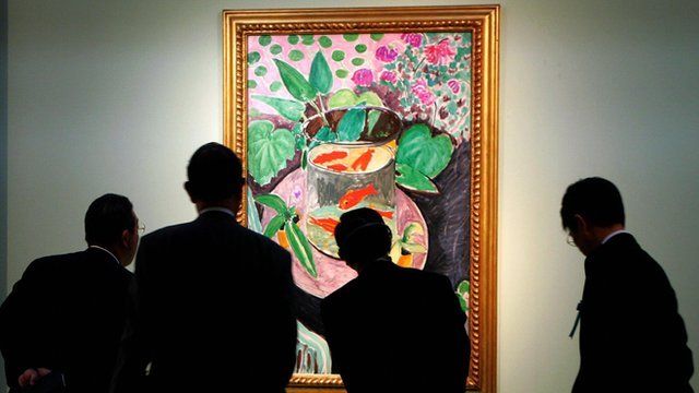 Japanese visitors look at the Gold Fish, a 1912 masterpiece by French painter Henri Matisse, during a preview of the exhibition 'Masterworks of French Impressionism and Modernism