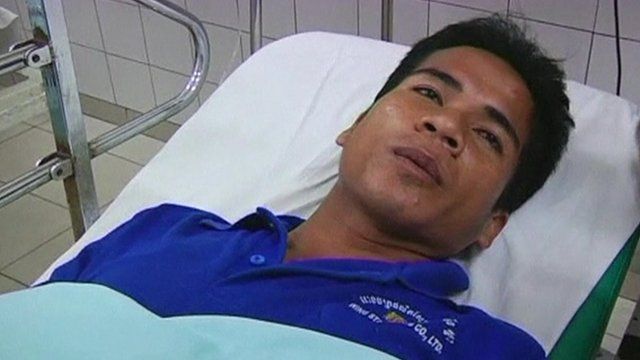 Factory worker in hospital following Cambodia shoe factory collapse