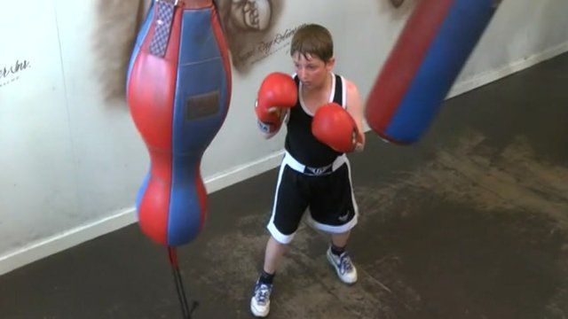 Young boy boxing