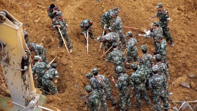 Rescuers look for landslide victims in Bijie, southwest Chinas Guizhou province