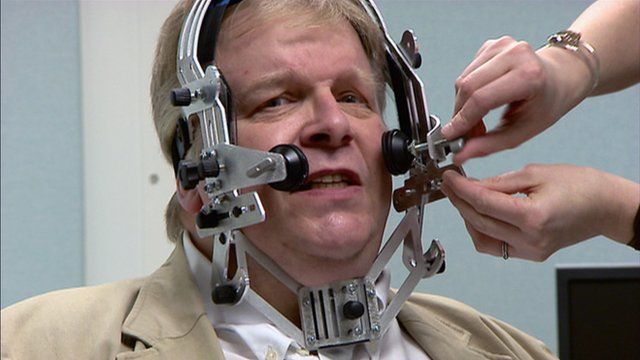 Kenneth Macdonald wears a facial scanner