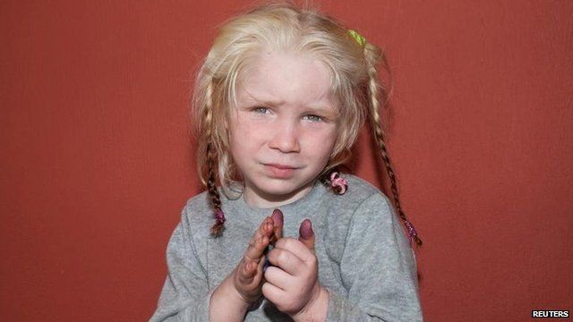 Handout photo of girl found in Greek Roma settlement (18 October)