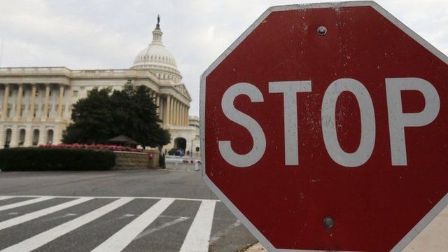A stop sign sits near the US Capitol in Washington on 1 October 2013