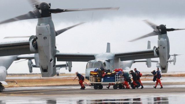 US Bell Boeing V-22 Osprey arrive at the airport to transport humanitarian workers to typhoon affected areas on November 14, 2013 in Tacloban, Leyte, Philippines to help people affected by typhoon