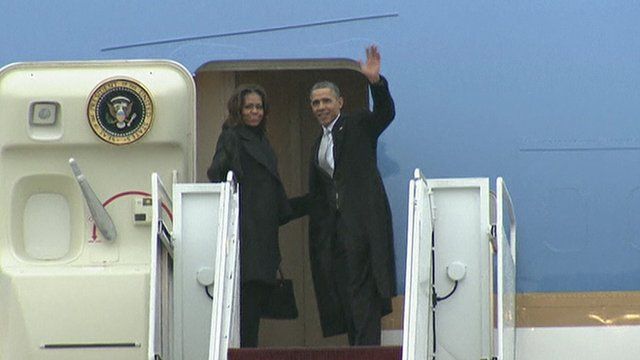 President Obama and his wife Michelle leaving for South Africa
