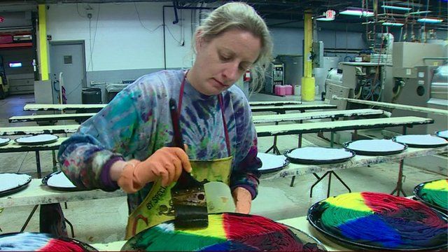 A worker at a factory in the US which is doing well financially
