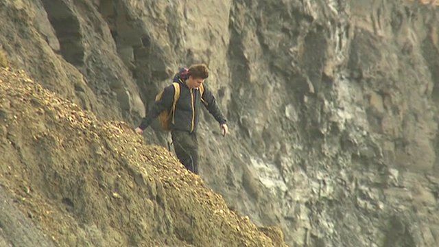 Man near cliffs in Dorset