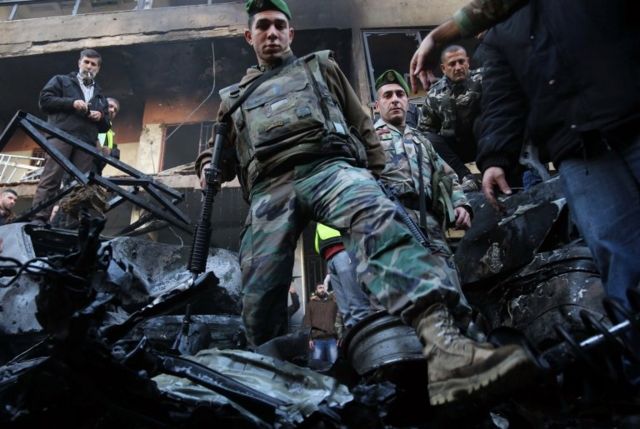 Lebanese soldiers inspect Beirut bomb aftermath