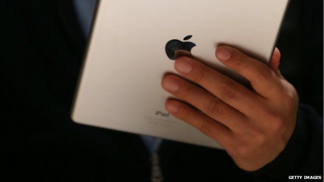 Man holding an iPad