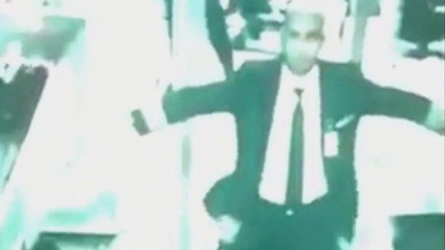 CCTV image of pilot in security check