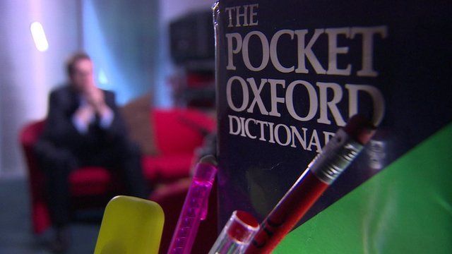 dictionary and pencils