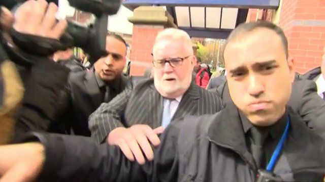 Paul Flowers leaving Leeds Magistrates' Court