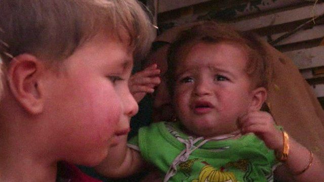 Displaced children fleeing Irbil, Iraq