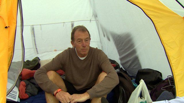 Man sitting in a tent