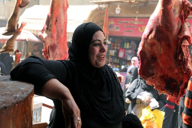 A female butcher in her Cairo shop on 8 March