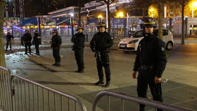 Police officers secure the Stade de France stadium during the international friendly football game France against Germany