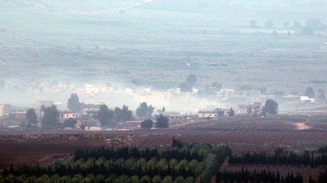 Smoke billows from buildings in the Wazzani river area on the Lebanese-Israeli borders following Israeli artillery fire (4 January 2016)