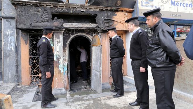 Members of the Egyptian security stand guard in the restaurant that was attacked near Cairo, Egypt, 04 December 2015