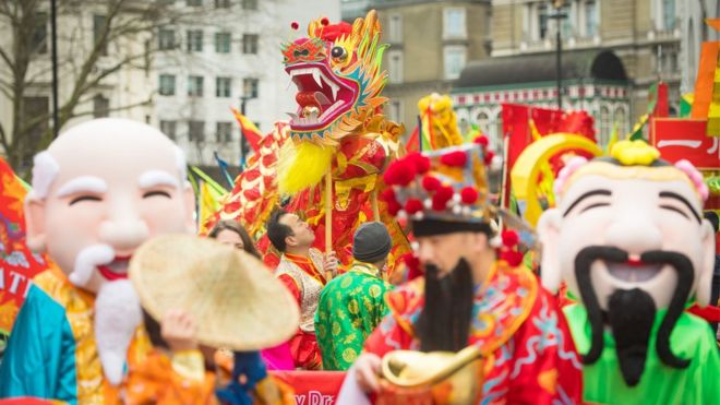 Performers await the start of the Chinese New Year parade in London