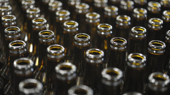 Empty beer bottles are pictured on on February 22, 2016 at the Coreff brewery based in Carhaix-Plouguer, western of France.