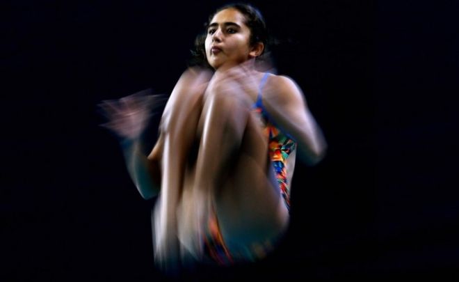 Maha Khaled Eissa of Egypt competes in the Girls A 1m springboard during the Senet Diving Cup