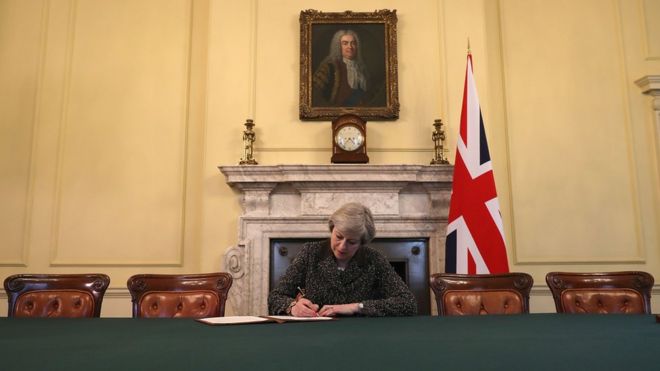 Theresa May signs letter that will trigger Brexit