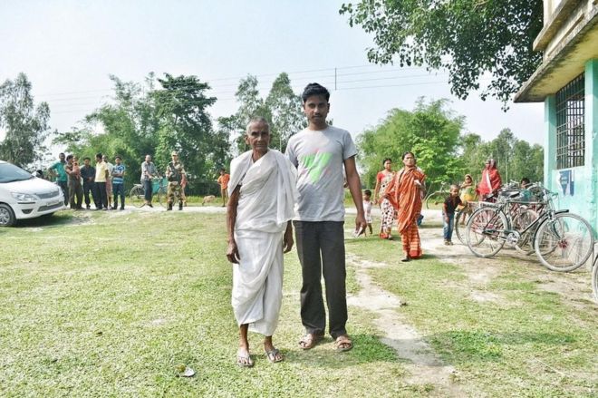 Sudama Shil, 30, brought his 90-year-old grandmother Bashanti Shil to the polling booth.