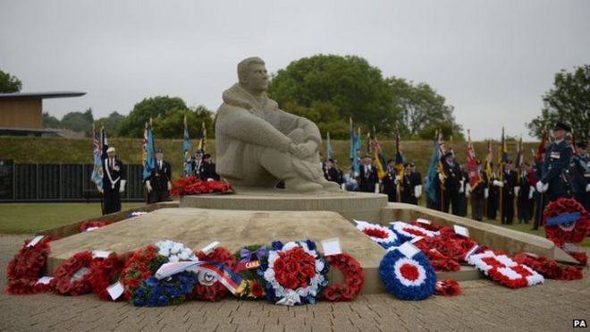 Flowers at the base of statue during the memorial day