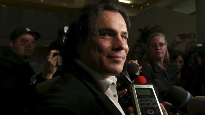 Senator Patrick Brazeau speaks to journalists