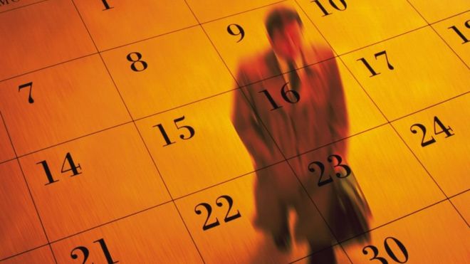 Man walks across calendar