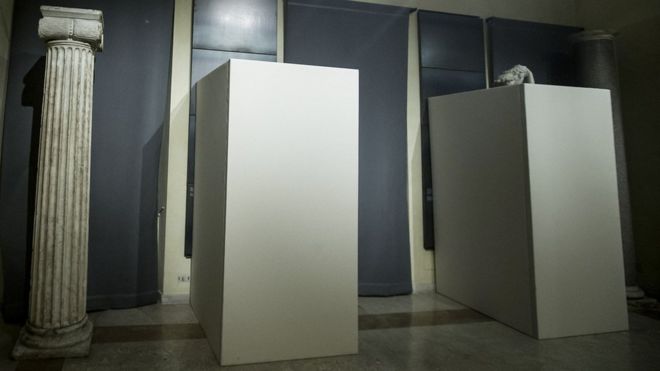 Plywood boxes conceal nude statues at a museum in Rome for the Iranian president's visit