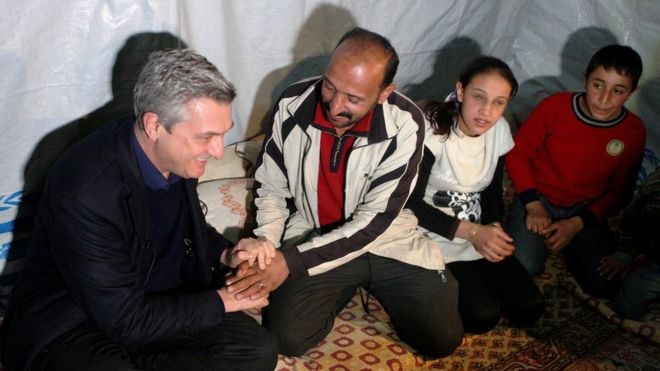 UN refugee agency chief Filippo Grandi (left) meeting Syrian refugees in the Bekaa Valley, Lebanon, 22 January