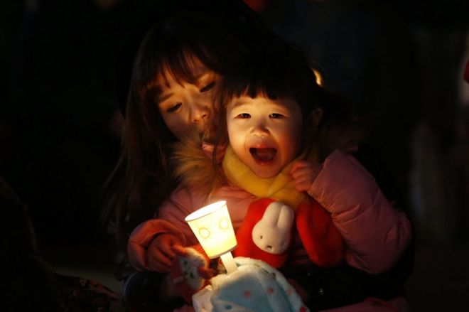 Mujer con niña en Corea del Sur