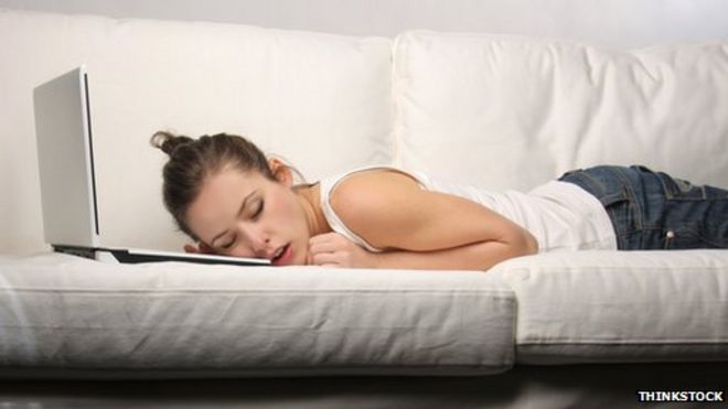 young lady asleep on laptop