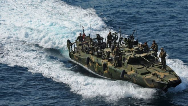 A US riverine patrol boat in action