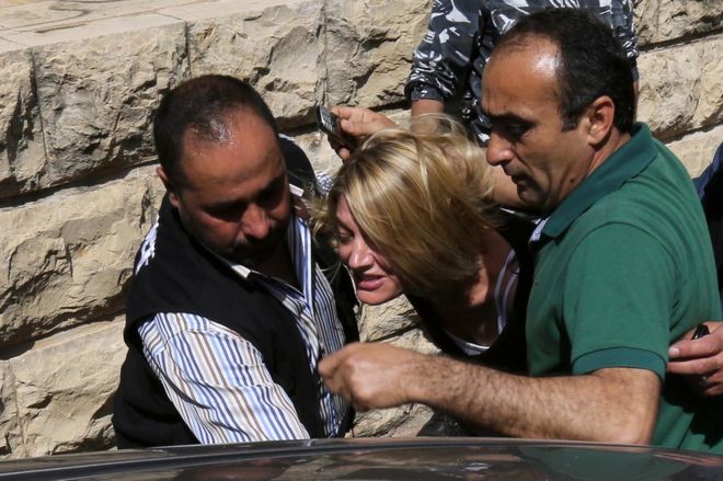 Australian journalist Tara Brown is escorted from a Beirut court on Monday