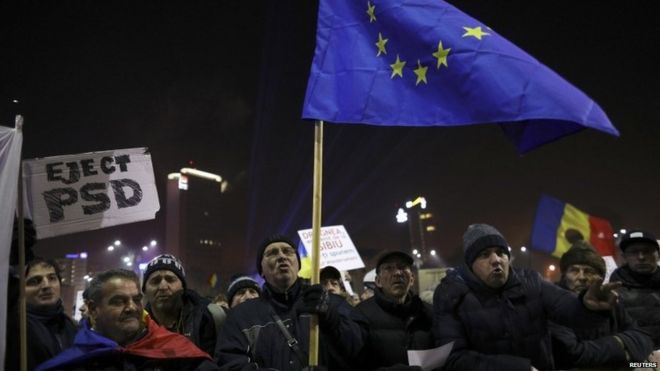 Protesters hold EU flag during a demonstration in Bucharest, Romania, February 5, 2017.