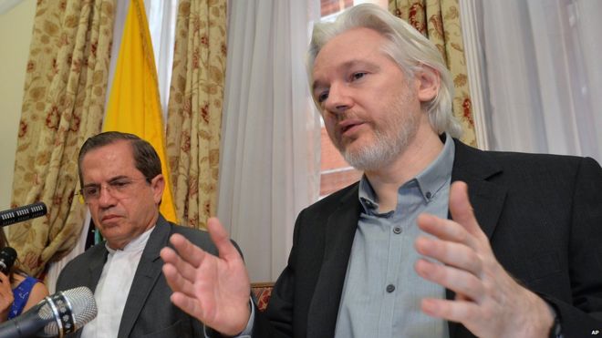 File photo from 2014 shows Ecuador's Foreign Minister Ricardo Patino, left, and WikiLeaks founder Julian Assange inside the Ecuadorian Embassy in London