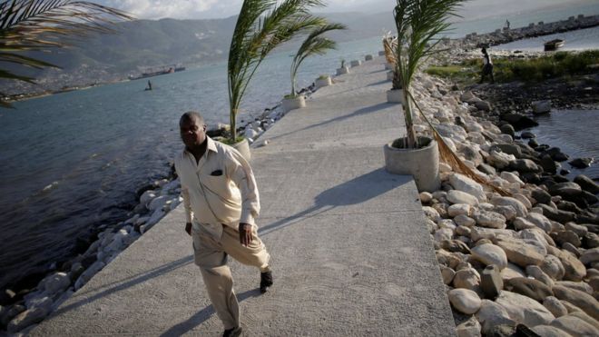 A man walks on a pier in Port-au-Prince, Haiti, on 1 October